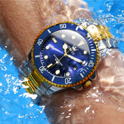OLEVS Classic Dress Men's Wristwatch, Two-Tone Gold Plated Stainless Steel Bracelet, Blue Dial, Analog Quartz Movement, Date Display, Waterproof, Luminous Hands, 5885