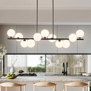Uznhty 11-Lights Linear Chandelier with Frosted White Glass Globes, Black Metal Frame, Adjustable Height, 51 Inch