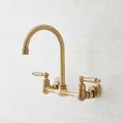 Signature Hardware SH349723AGBR Jessamy 1.75 GPM Wall-Mounted Widespread Bridge Kitchen Faucet - Aged Brass