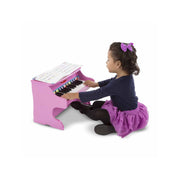 Melissa & Doug Learn-to-Play Pink Piano With 25 Keys and Color-Coded Songbook