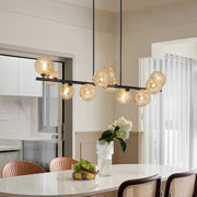 Lzawvm Linear Chandelier, 11-Light Pendant with Amber Swirled Glass Globes, Black Metal Finish, Adjustable Height, 51 Inch, 48719