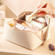 USIONE Travel Makeup Bags 2-Pack, Waterproof PU Leather Cosmetic Organizer with Flat-Open Design, Transparent Brush Compartment, Beige and Orange