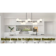 Uznhty 11-Lights Linear Chandelier with Frosted White Glass Globes, Black Metal Frame, Adjustable Height, 51 Inch