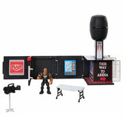 Mattel JFX07 WWE Knuckle Crunchers Final Boss Microphone Playset with The Rock 3.25-Inch Action Figure, Breakaway Table and Camera Accessories