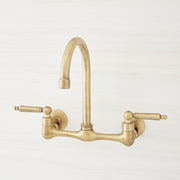 Signature Hardware SH349723AGBR Jessamy 1.75 GPM Wall-Mounted Widespread Bridge Kitchen Faucet - Aged Brass
