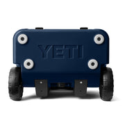 YETI Roadie 32 Wheeled Cooler, Navy, 32 qt, Durable Rotomolded Construction, NeverFlat Wheels, BearFoot Non-Slip Feet