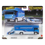 Hot Wheels Team Transport Toy Vehicle Set, Ford Capri GR5 Race Car with Fleet Flyer Transporter Truck, Blue, Real Riders Rubber Tires, Metal Construction, 1:64 Scale, JHX89