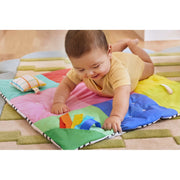 Lovevery Anytime Activity Mat, Double-Sided Portable Baby Play Mat with Silicone Teether, Sound Pillow, Crinkle Flap, Ribbons, Multicolor, Lightweight