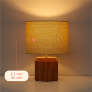 Beautiful by Drew Barrymore Black Faux Ribbed Wood Table Lamp, 14 in, Brushed Nickel Neck, Tan Linen Shade, Corded Electric