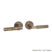 Signature Hardware SH552157AB EH.RO.2625.20.L.ABS-NB-N - Straight Knurled Solid Brass Privacy Interior Door Set w/ Round Escutcheon Lever Handle accomodates 28 Degree Privacy Latch - Left Hand - No Backset - Antique Brass