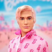 Mattel Barbie The Movie Ken Collectible Doll, Ryan Gosling as Ken, Pink Jumpsuit with B Detail, White Sneakers, Multicolor Roller Skates, Display Stand, JCP80