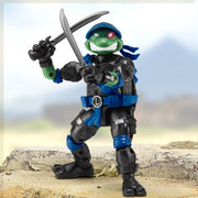 Playmates Toys Teenage Mutant Ninja Turtles x G.I. Joe Leo and Snake Eyes Action Figure with Twin Katana Swords and Ooze Blaster, Multi, 5 Inch, 81901E