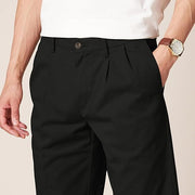 Amazon Essentials F16AE60001 Men's Classic-Fit Wrinkle-Resistant Pleated Dress Pant, Black, 54W x 28L - 60% Cotton
