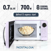 Nostalgia Retro Countertop Microwave Oven, 0.7 Cu Ft, 700-Watt, 8 Auto Cook Programs, LED Digital Display, Lavender, NRMOPMSW7LV6A