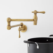 Signature Hardware 488311 4.6 GPM Double Handle Wall Mounted Retractable Pot Filler - Aged Brass