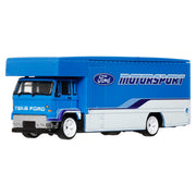 Hot Wheels Team Transport Toy Vehicle Set, Ford Capri GR5 Race Car with Fleet Flyer Transporter Truck, Blue, Real Riders Rubber Tires, Metal Construction, 1:64 Scale, JHX89