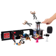 Mattel JFX07 WWE Knuckle Crunchers Final Boss Microphone Playset with The Rock 3.25-Inch Action Figure, Breakaway Table and Camera Accessories