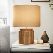 Beautiful by Drew Barrymore Black Faux Ribbed Wood Table Lamp, 14 in, Brushed Nickel Neck, Tan Linen Shade, Corded Electric