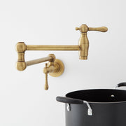 Signature Hardware 488311 4.6 GPM Double Handle Wall Mounted Retractable Pot Filler - Aged Brass