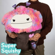 Jazwares Squishmallows Frumpy The Pink and Black Bigfoot Plush, Jumbo 20-Inch, Easter Tie-Dye Hair with Heart Headband, Soft and Squishy SQVA01477
